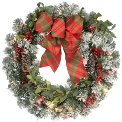 National Tree Company 24" General Store Snowy Wreath With LED Lights And Bow