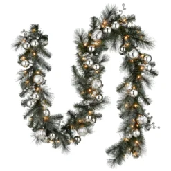 National Tree Company Pre-Lit Artificial Christmas Garland, Green, Silver Pine, White Lights, Decorated With Ball Ornaments, Plug In, Christmas Collection, 9 Feet